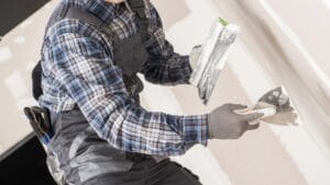 applying joint compound to a drywall surface